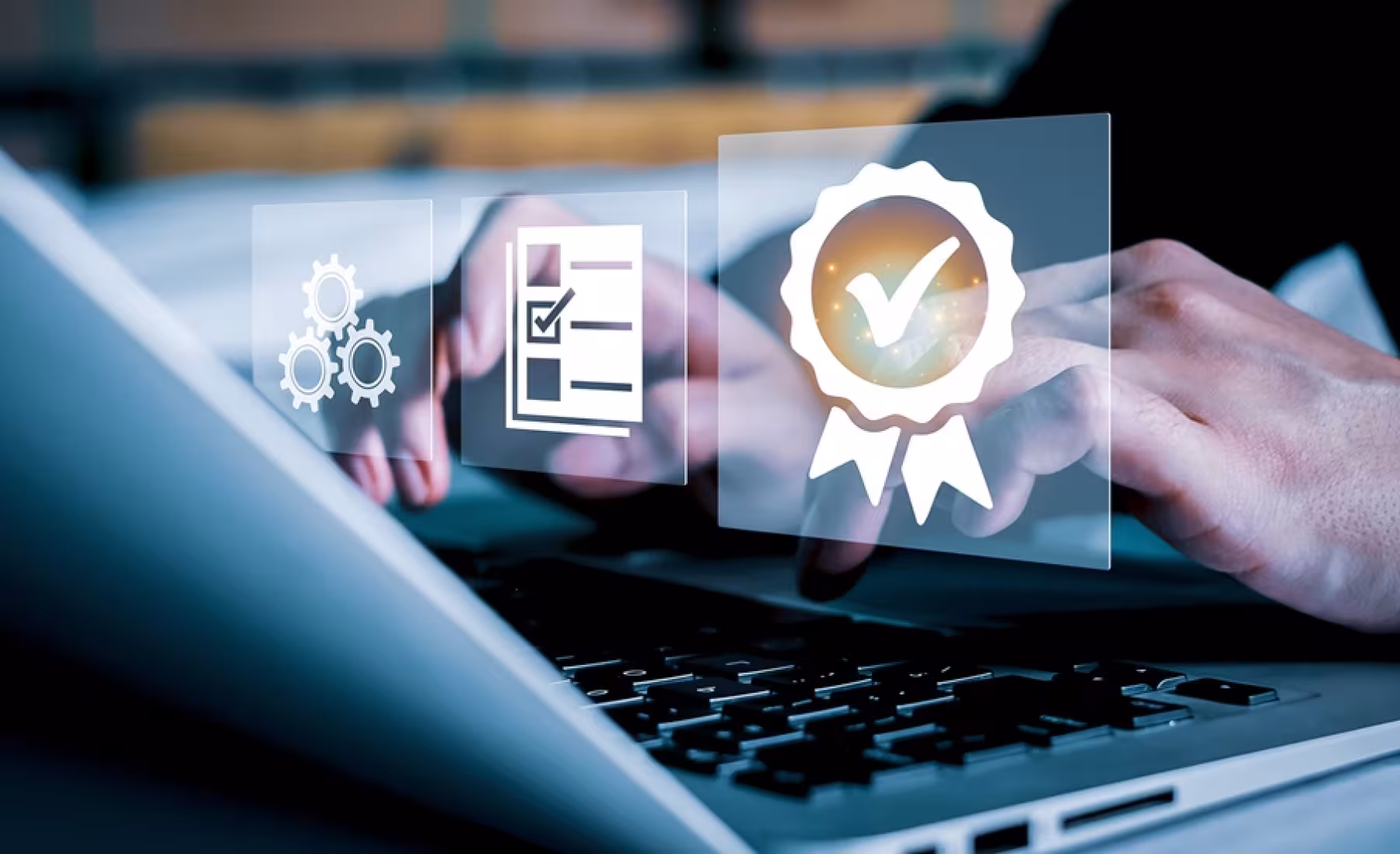 Close-up of hands typing on a laptop keyboard, with floating icons representing quality management concepts.